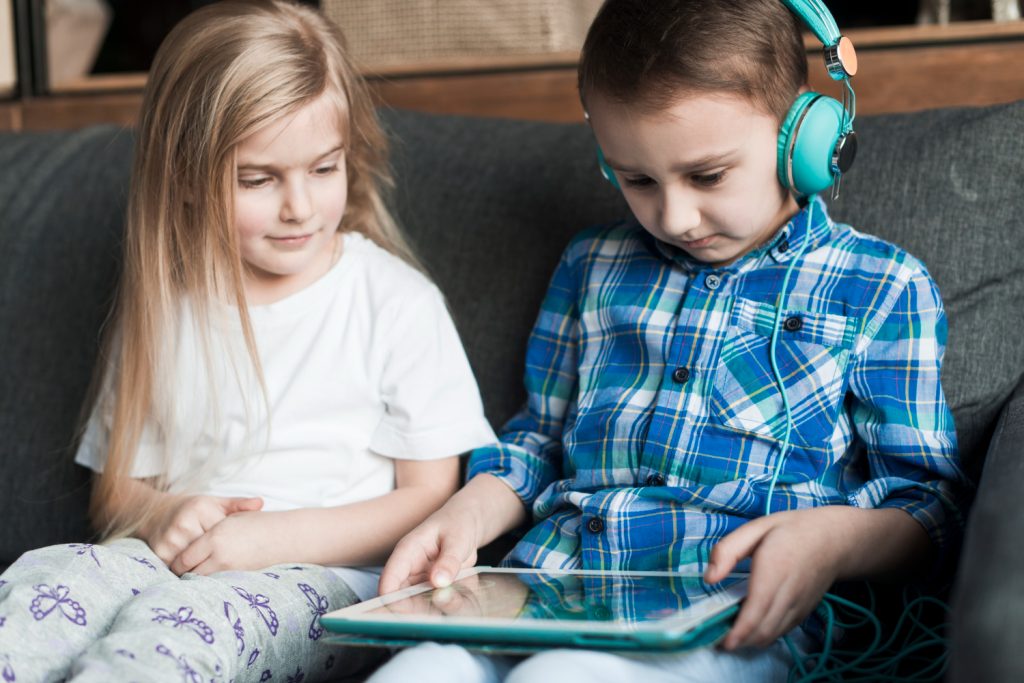 Children using their screen time in school