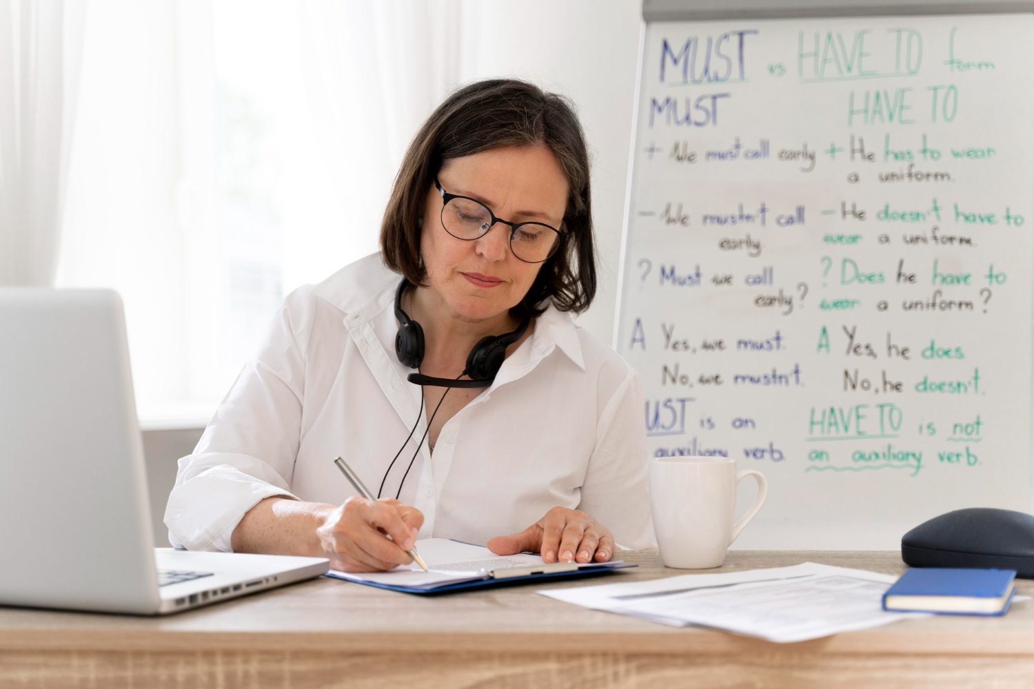 Teacher creating a grading rubrics template for her classes